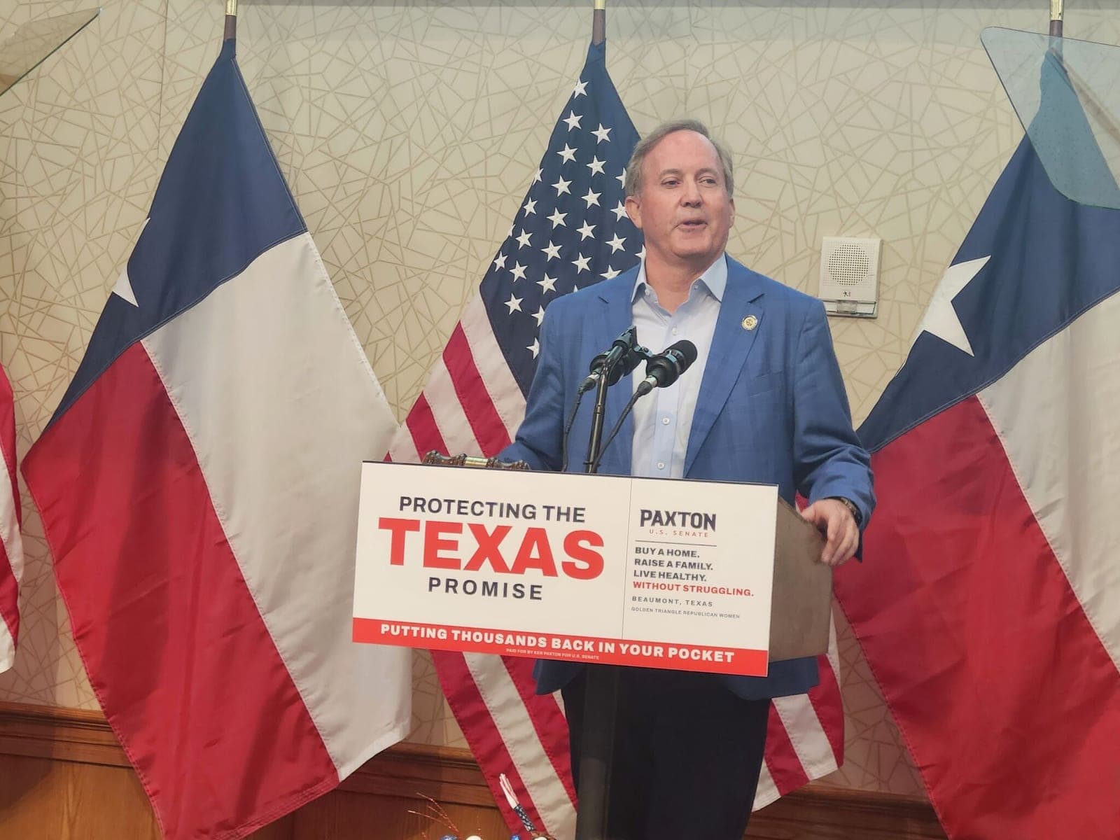 Where doesn't Ken Paxton own land?