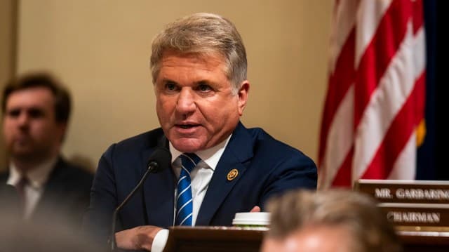 Two Democrats cross aisle to help tee up final vote on Russia sanctions bill